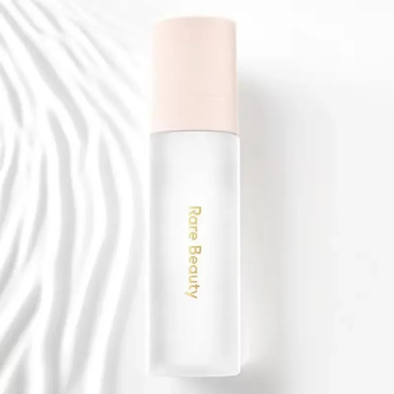 Rare Beauty Makeup Highlighter - بلاش سائل ناعم وملمع شفاه من